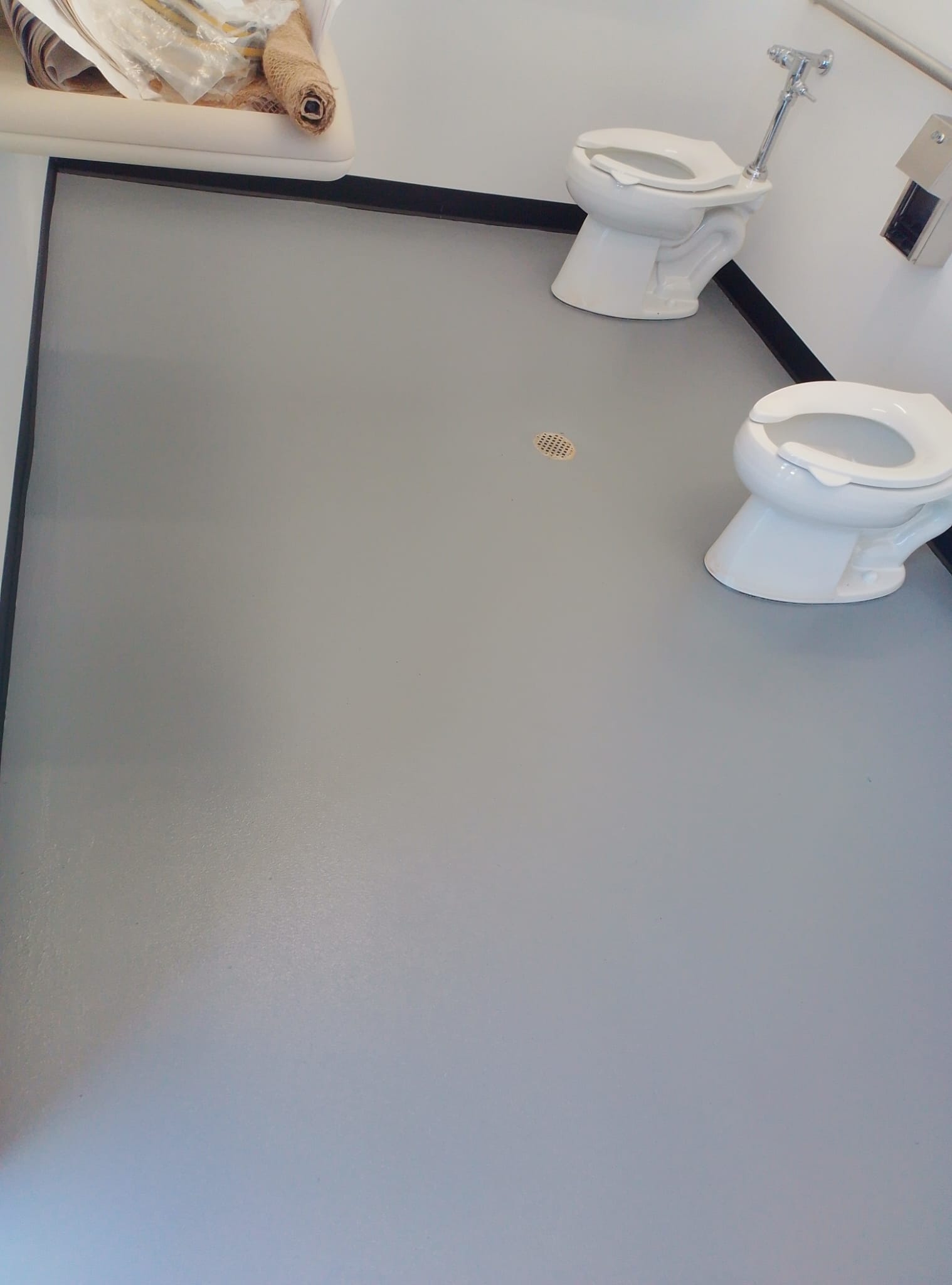 Finished bathroom floor coating