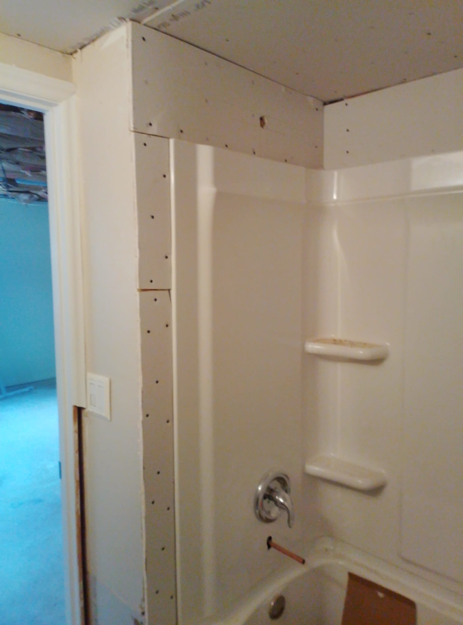 Bathroom tub surround repair in progress
